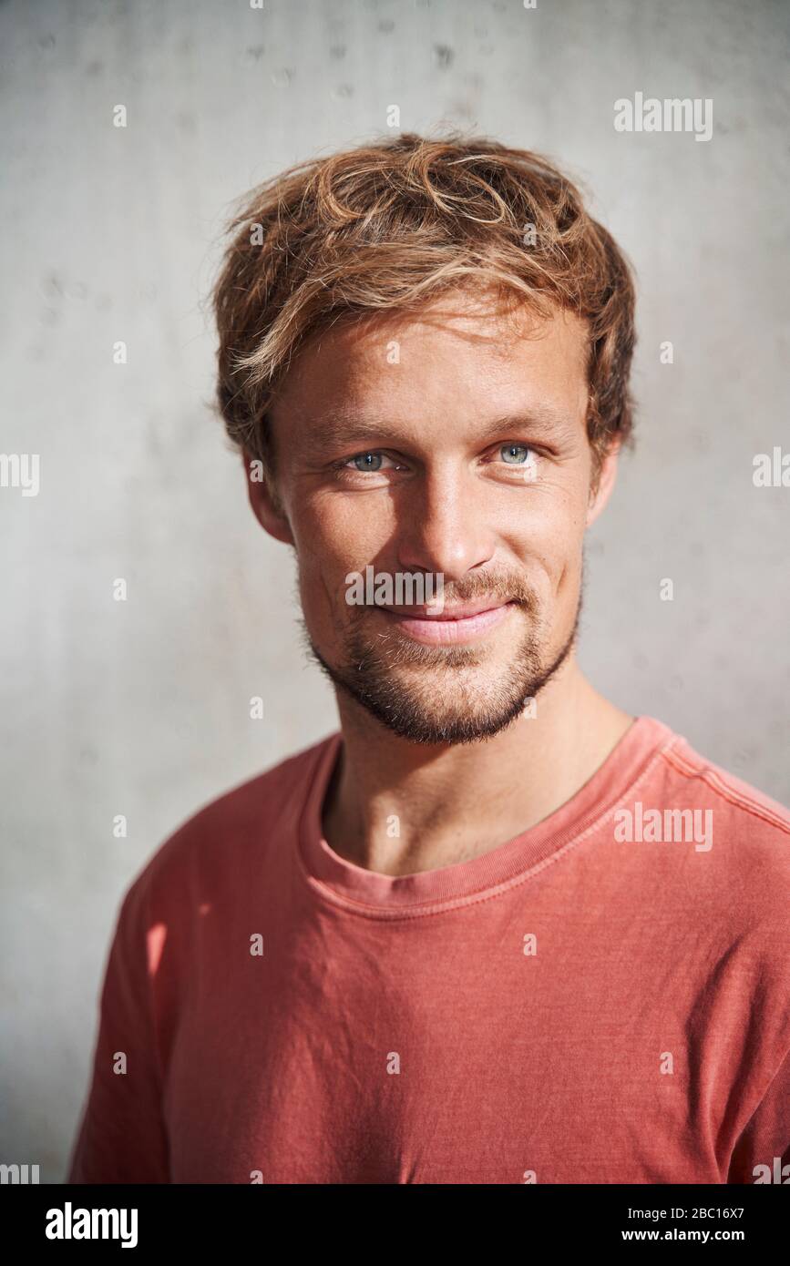 Portrait of man wearing red t-shirt Stock Photo