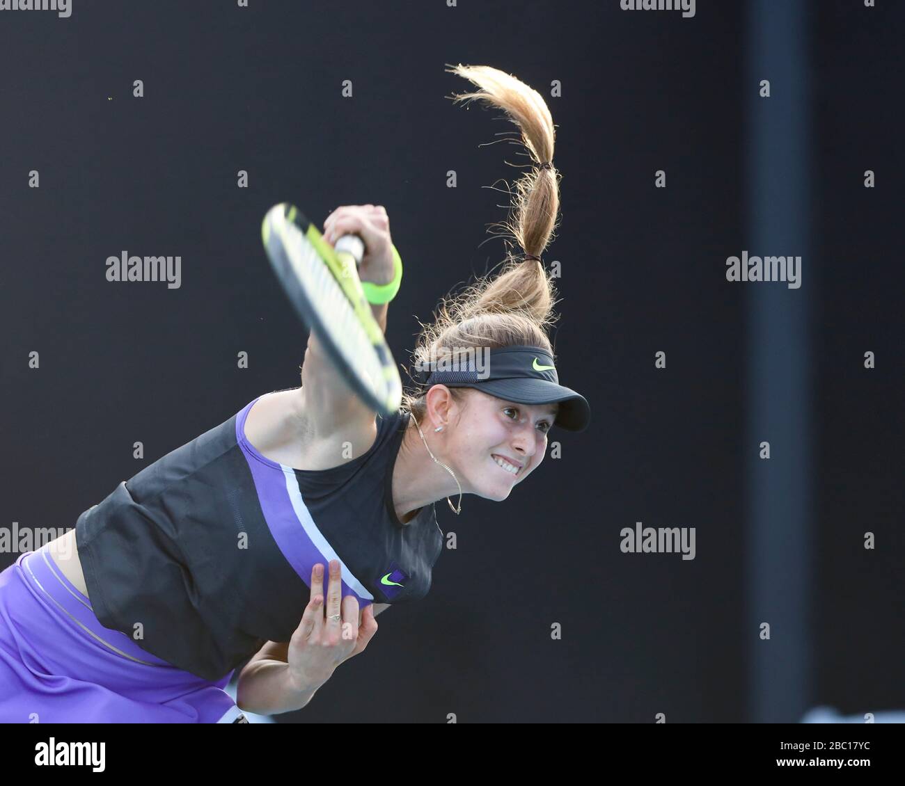 German tennis player Alexandra Vecic serving in Australian Open 2020 tennis tournament, Melbourne Park, Melbourne, Victoria, Australia Stock Photo