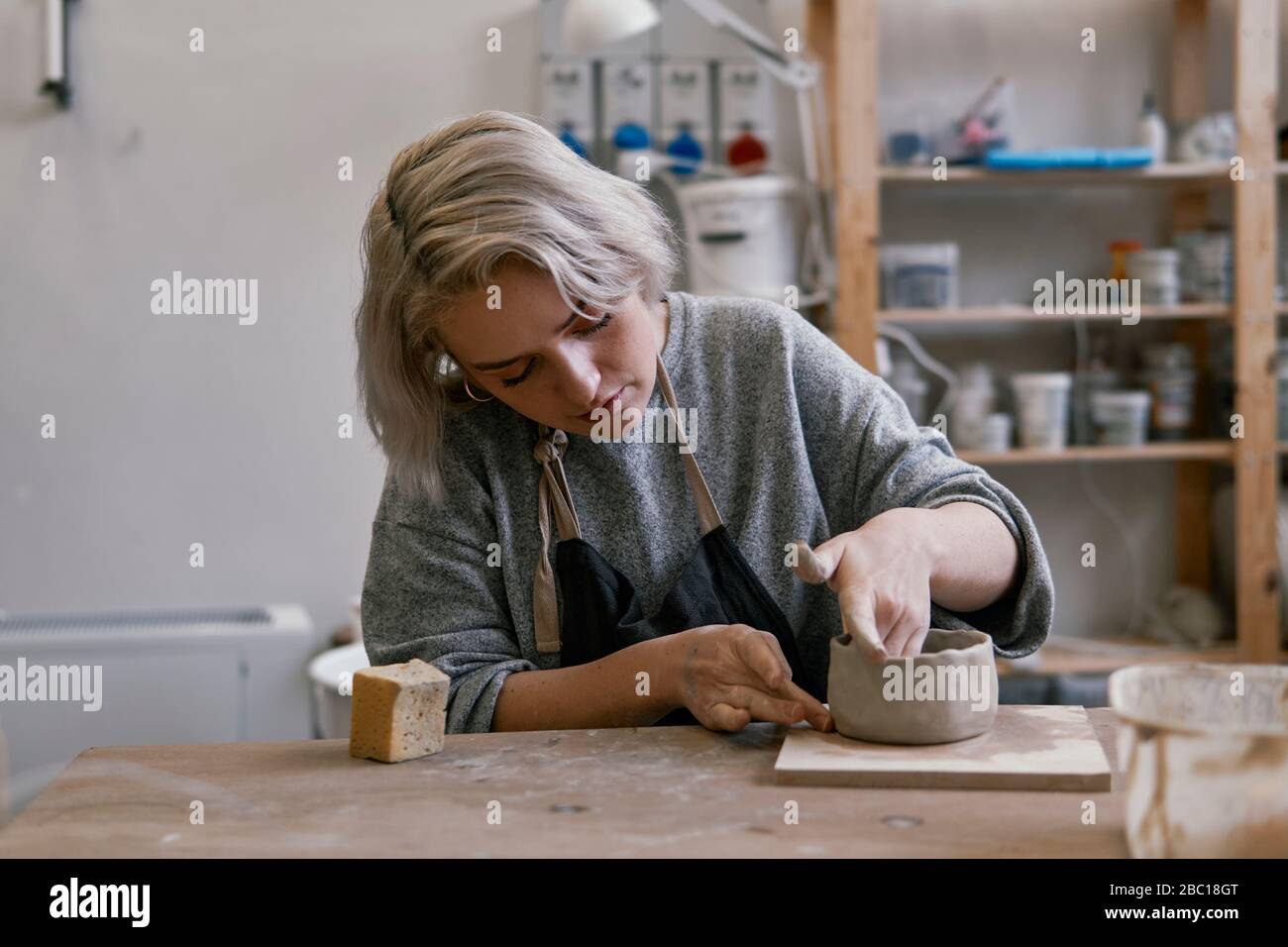 Working with pottery hi-res stock photography and images - Alamy