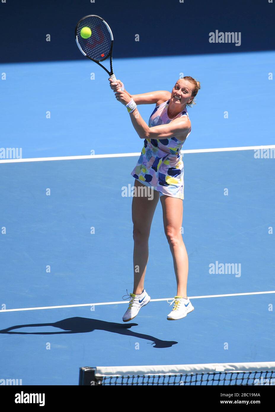 Czech tennis player Petra Kvitova (CZE) playing a high forehand volley during Australian Open 2020 tennis tournament, Melbourne Park, Melbourne, Victo Stock Photo