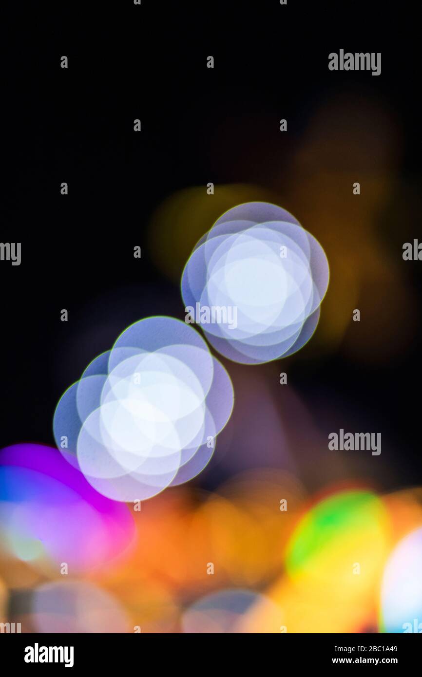 Germany, Colorful defocused lights at night Stock Photo