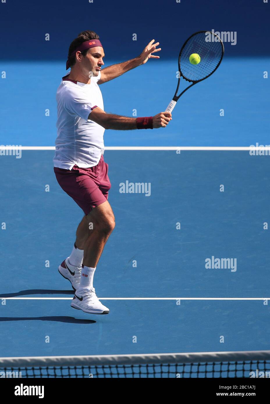 Swiss tennis player Roger Federer (SUI) playing forehand volley shot , Australian Open 2020 tennis tournament, Melbourne Park, Melbourne, Victoria, Au Stock Photo