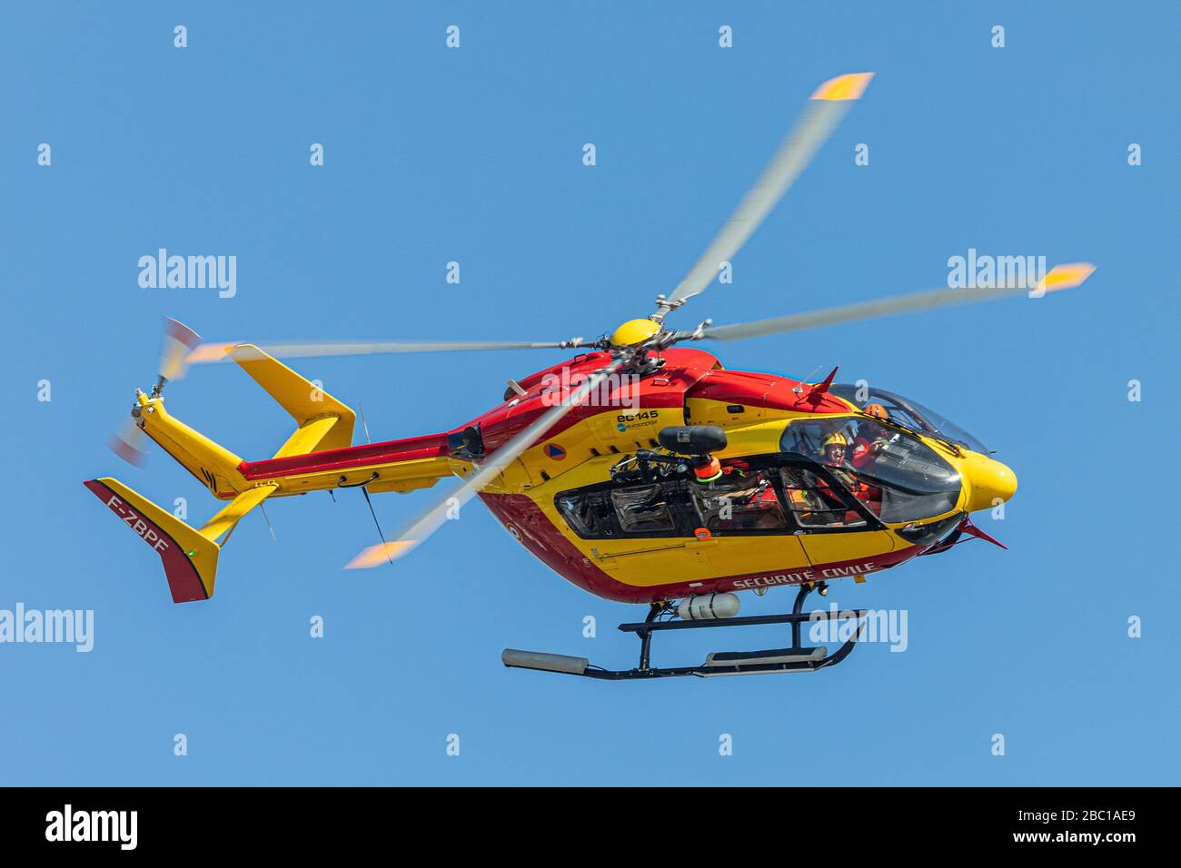 CIVIL EMERGENCY SERVICES' HELICOPTER IN FLIGHT, VANNES, FRANCE Stock Photo