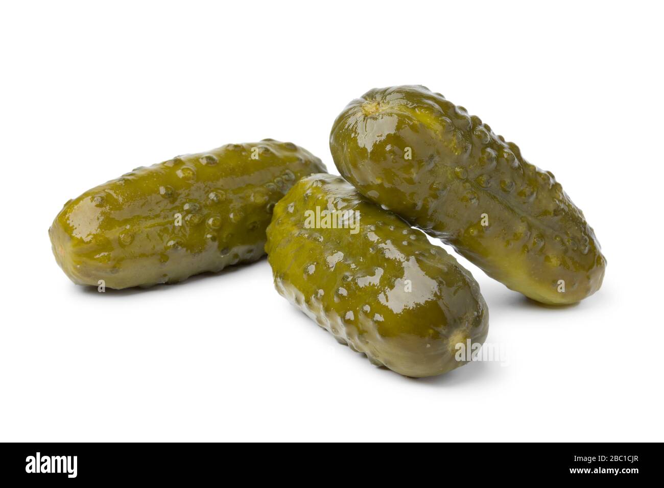 Whole marinated pickles isolated on white background Stock Photo