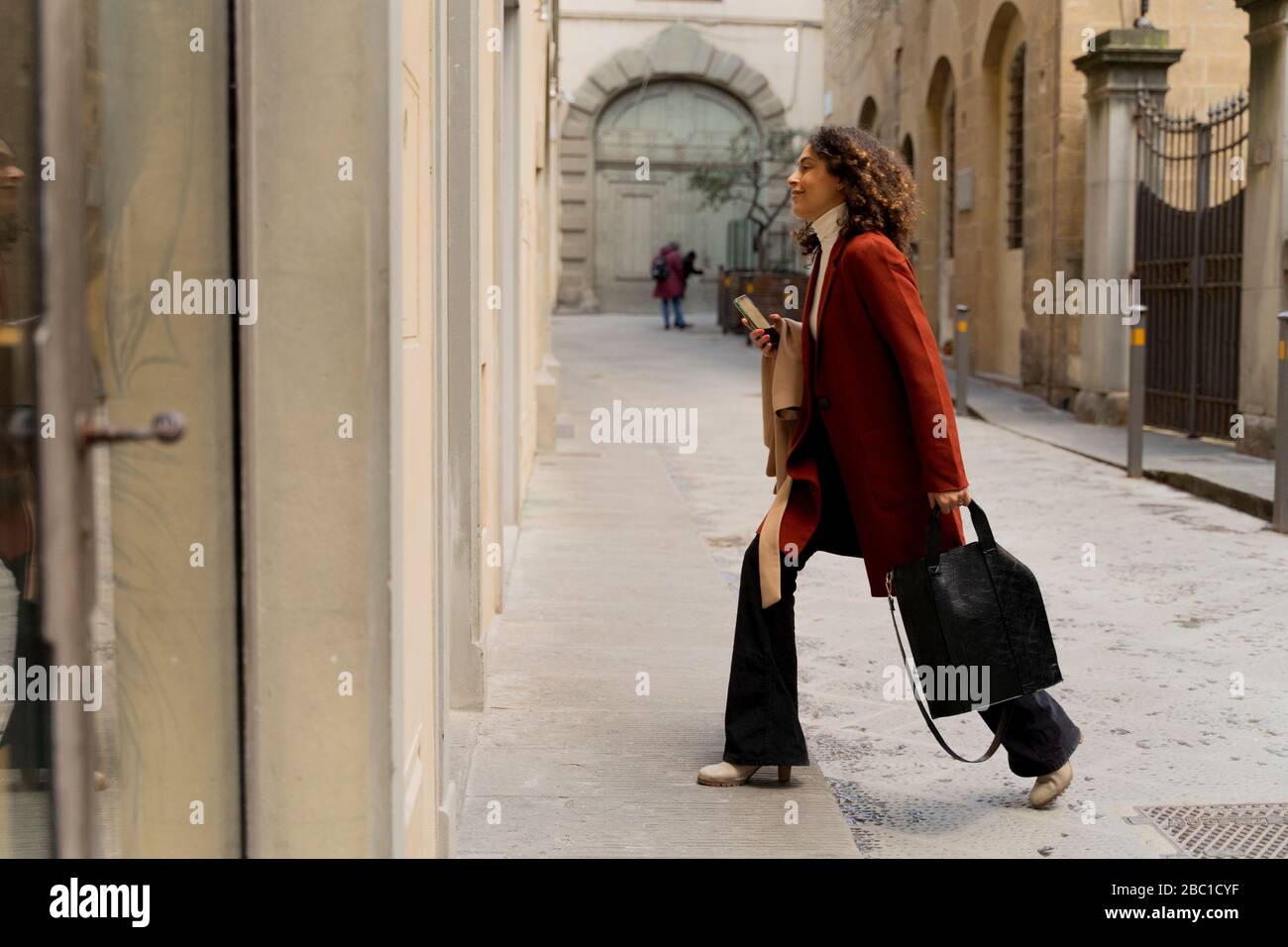 Mature elegant woman walking hi-res stock photography and images - Alamy