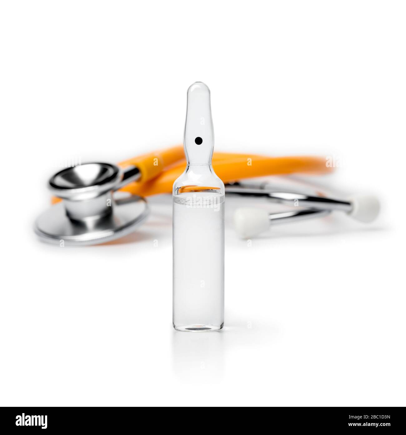 Medical drug ampule and stethoscope isolated on white background Stock Photo