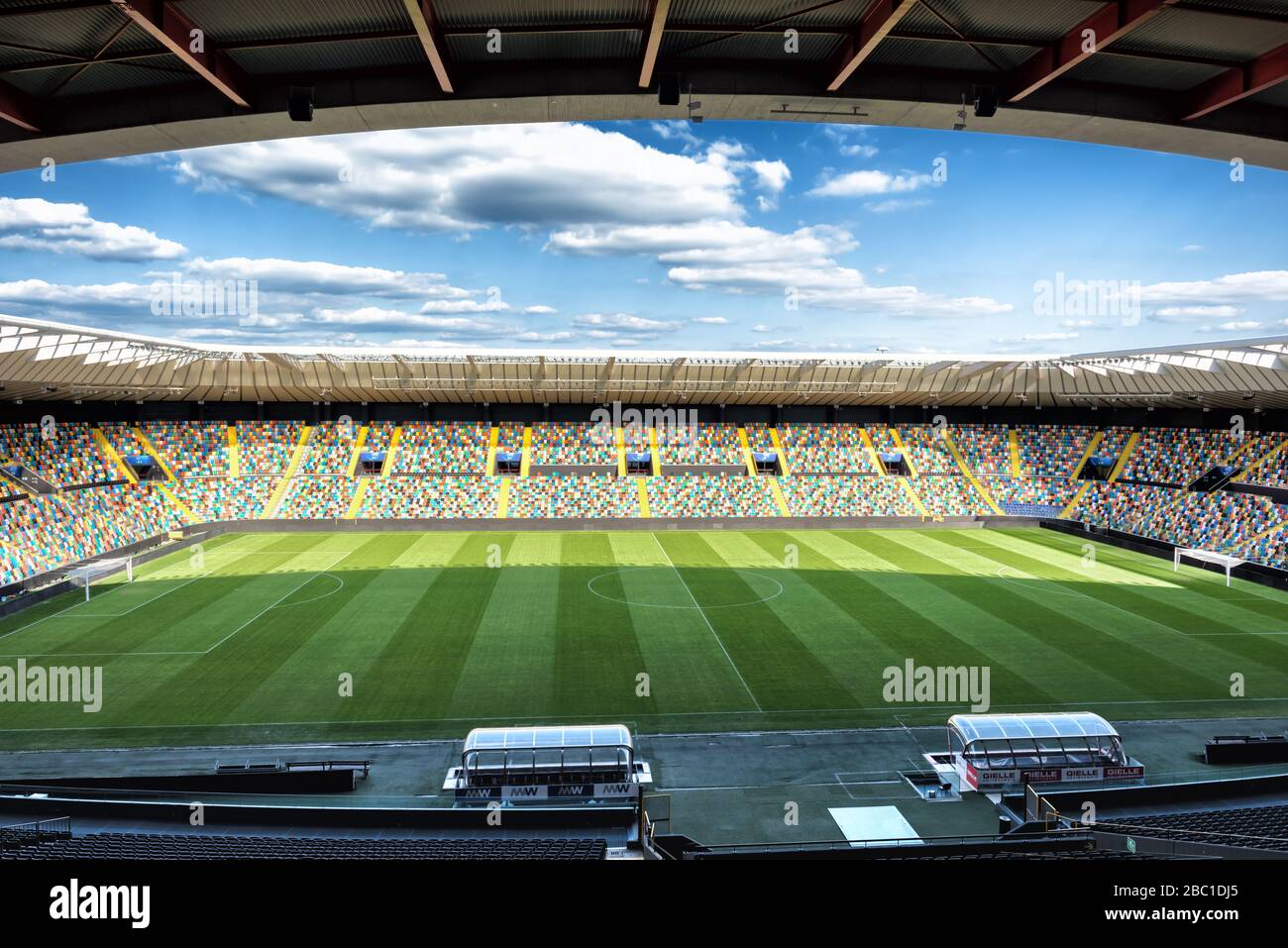 Empty stadium Soccer or football field, terraces and stand seats at  Dacia Arena - Stadio Friuli, the main Friuli Venezia Giulia region stadium. Stock Photo