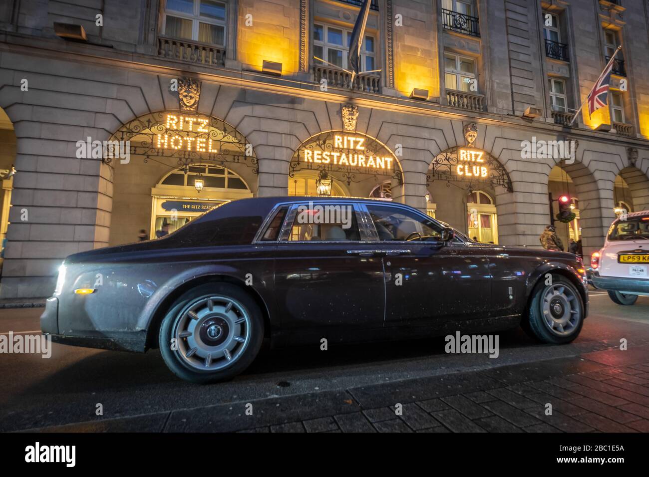 LONDON- DECEMBER, 2019: A Rolls Royce in front of the Ritz Hotel, a landmark hotel in Mayfair. Stock Photo