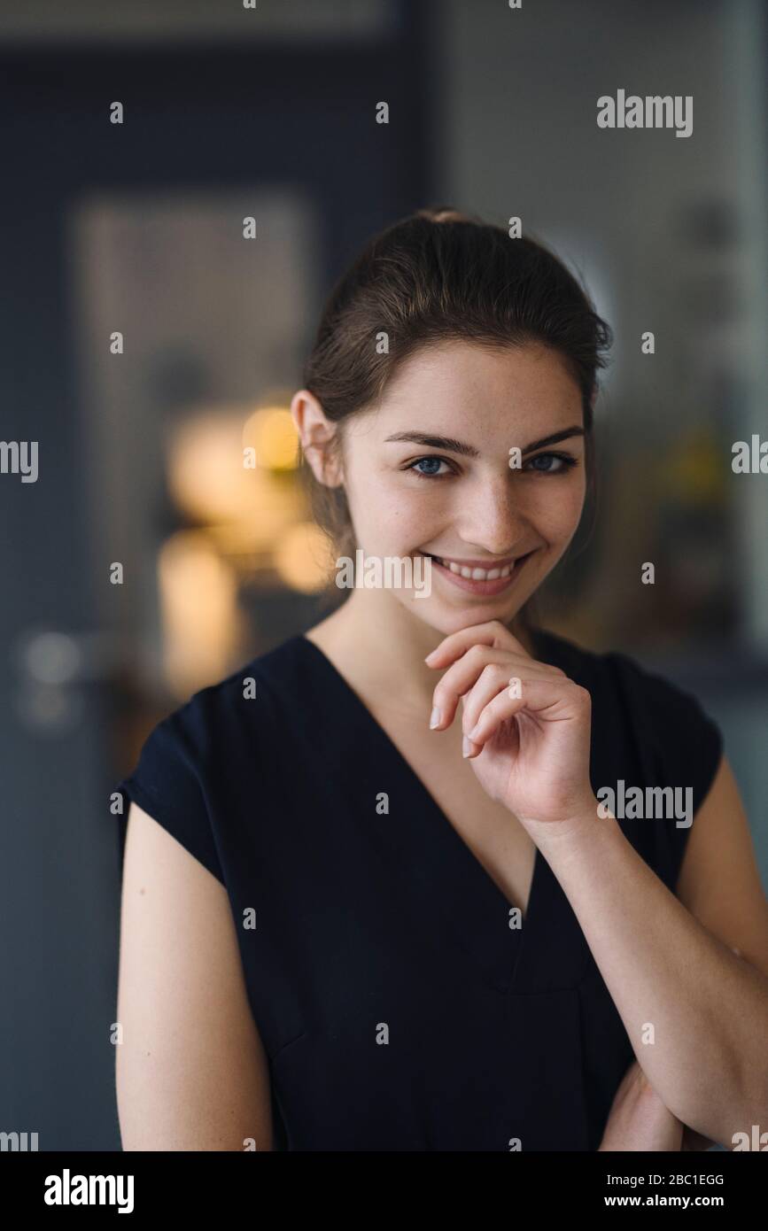 Portrait of happy young woman Stock Photo - Alamy