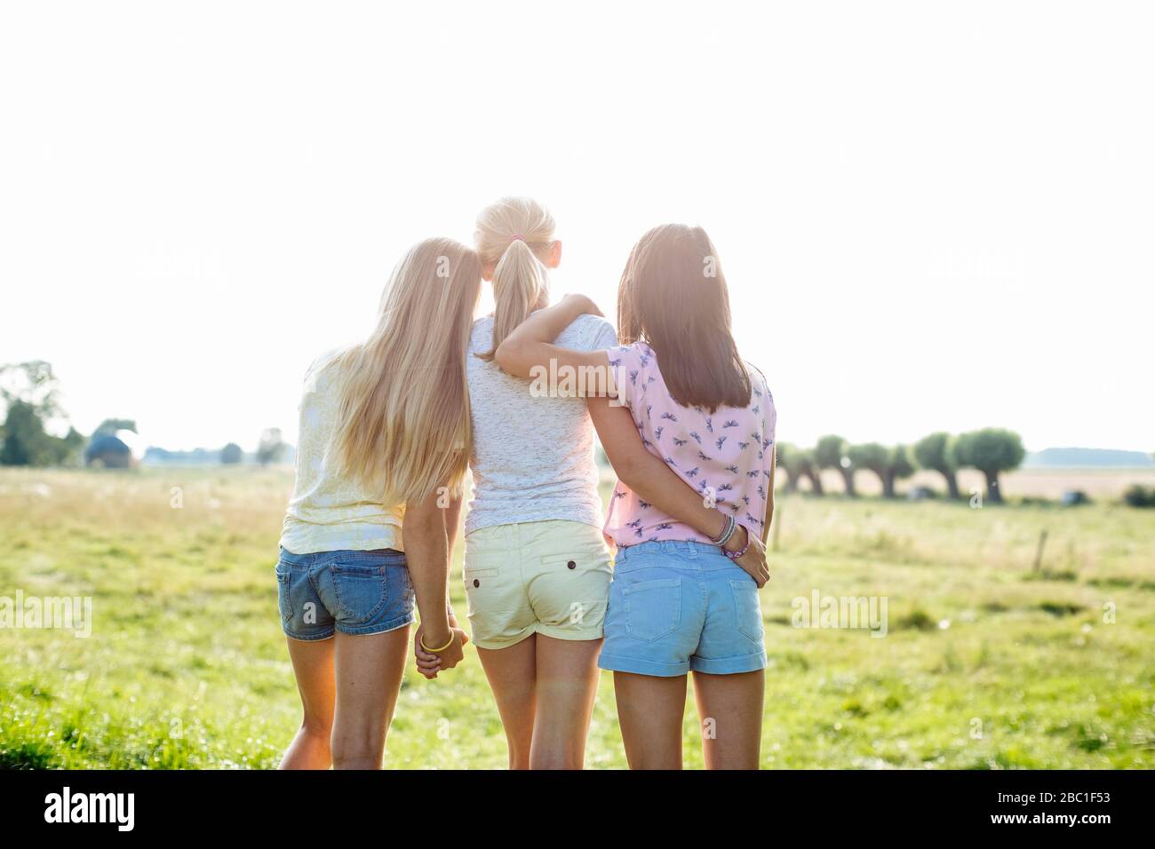 Children girls rear view in hi-res stock photography and images - Alamy