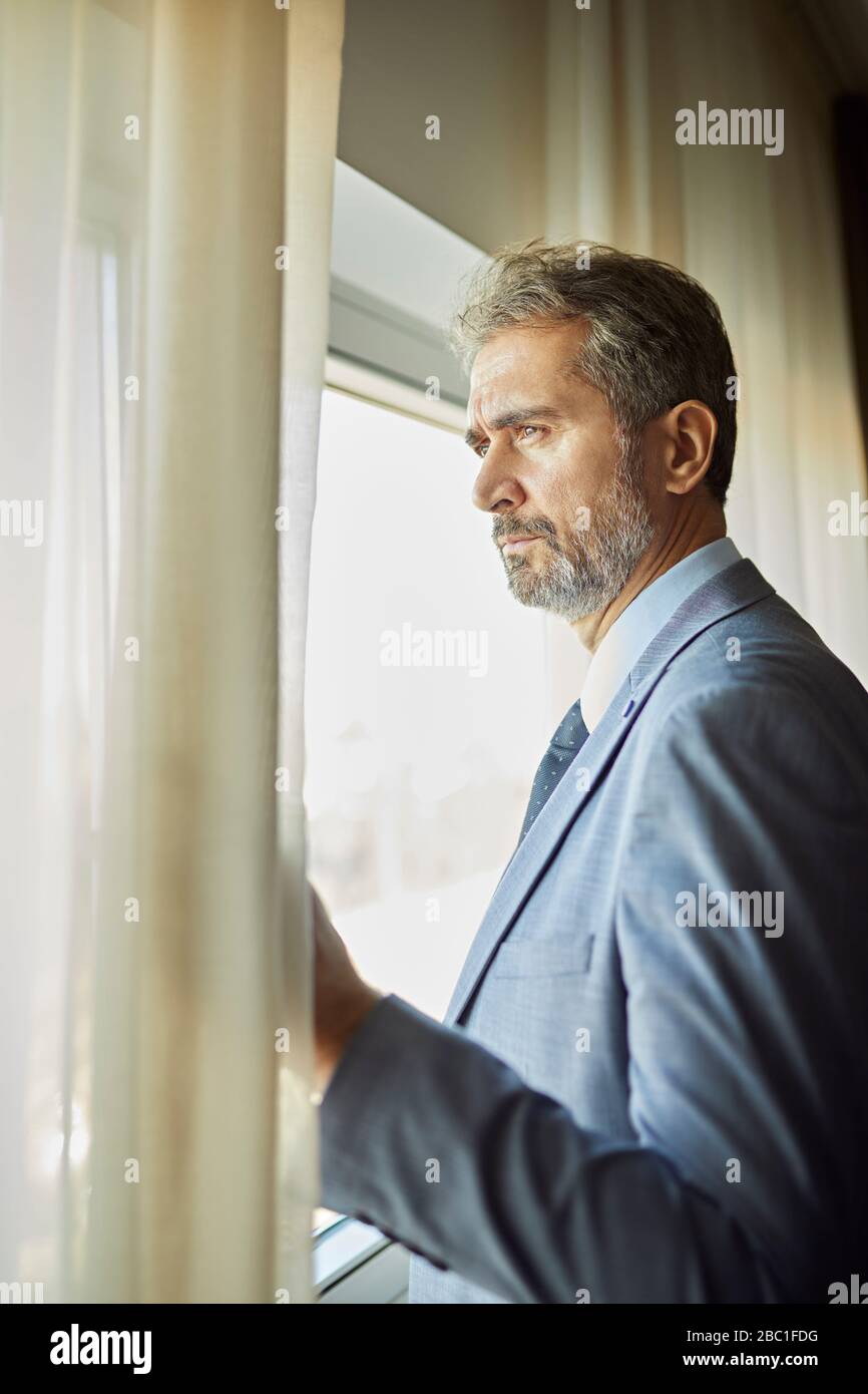 Men Look Out Window Man waiting looking out window hi-res stock photography and images - Alamy