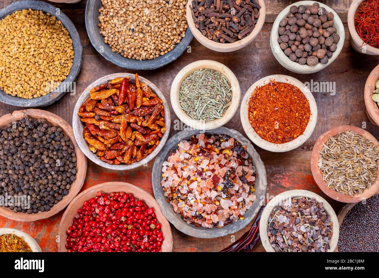 Indian spices collection, dried colorful condiment, nuts, pods and ...