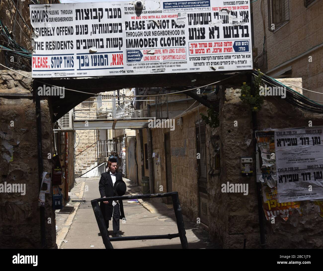 Jerusalem, Israel. 02nd Apr, 2020. An Ultra-Orthodox Jew walks without wearing a protective mask, against the coronavirus, in the Mea Shearim neighborhood in Jerusalem, on Thursday, April. 2, 2020. The cases of coronavirus has jumped in Israeli Ultra-Orthodox cities, amid growing concerns of a major outbreak of COVID-19 in the religious communities. Photo by Debbie Hill/UPI Credit: UPI/Alamy Live News Stock Photo