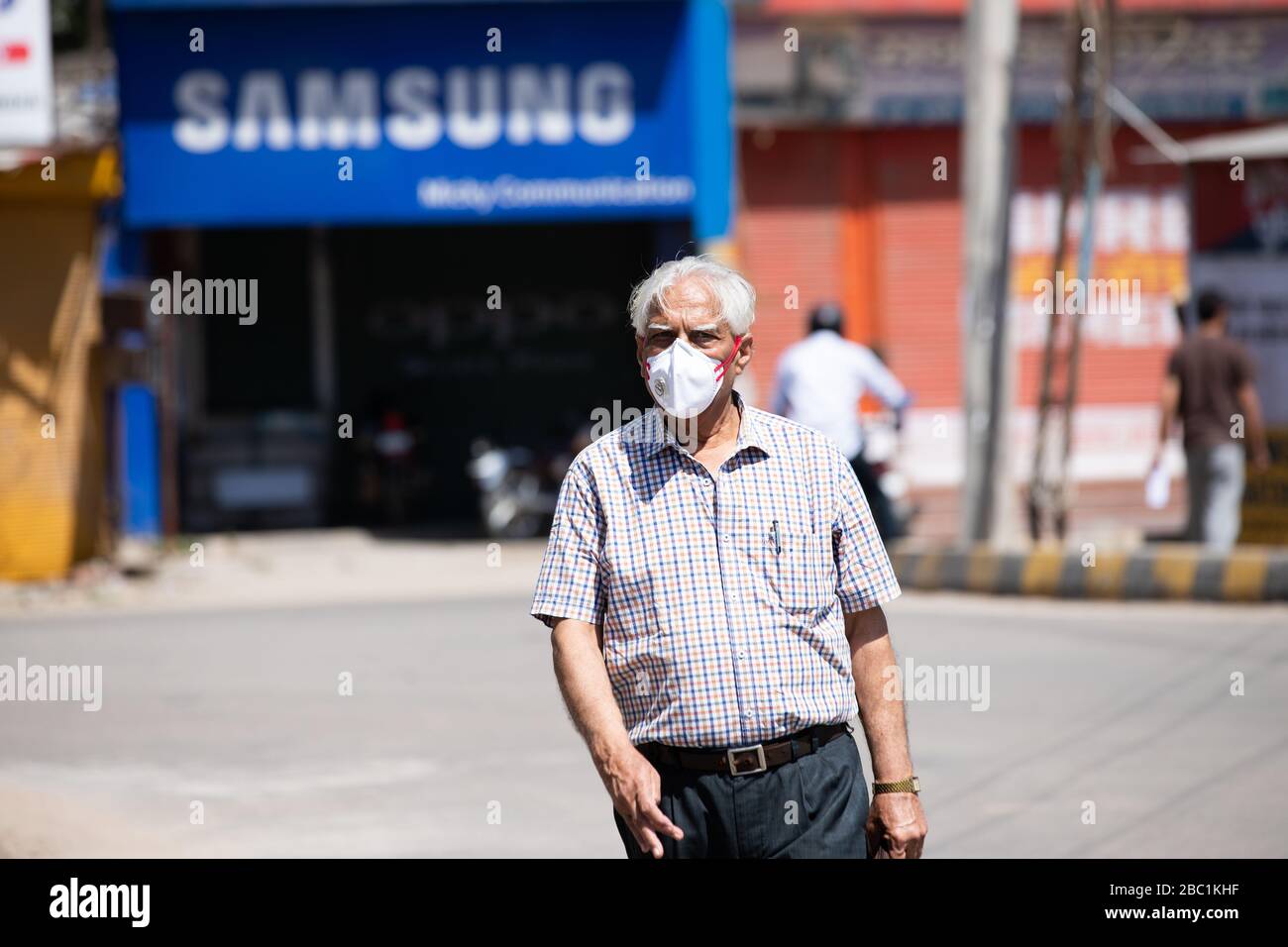 India old man on mask hi-res stock photography and images - Alamy