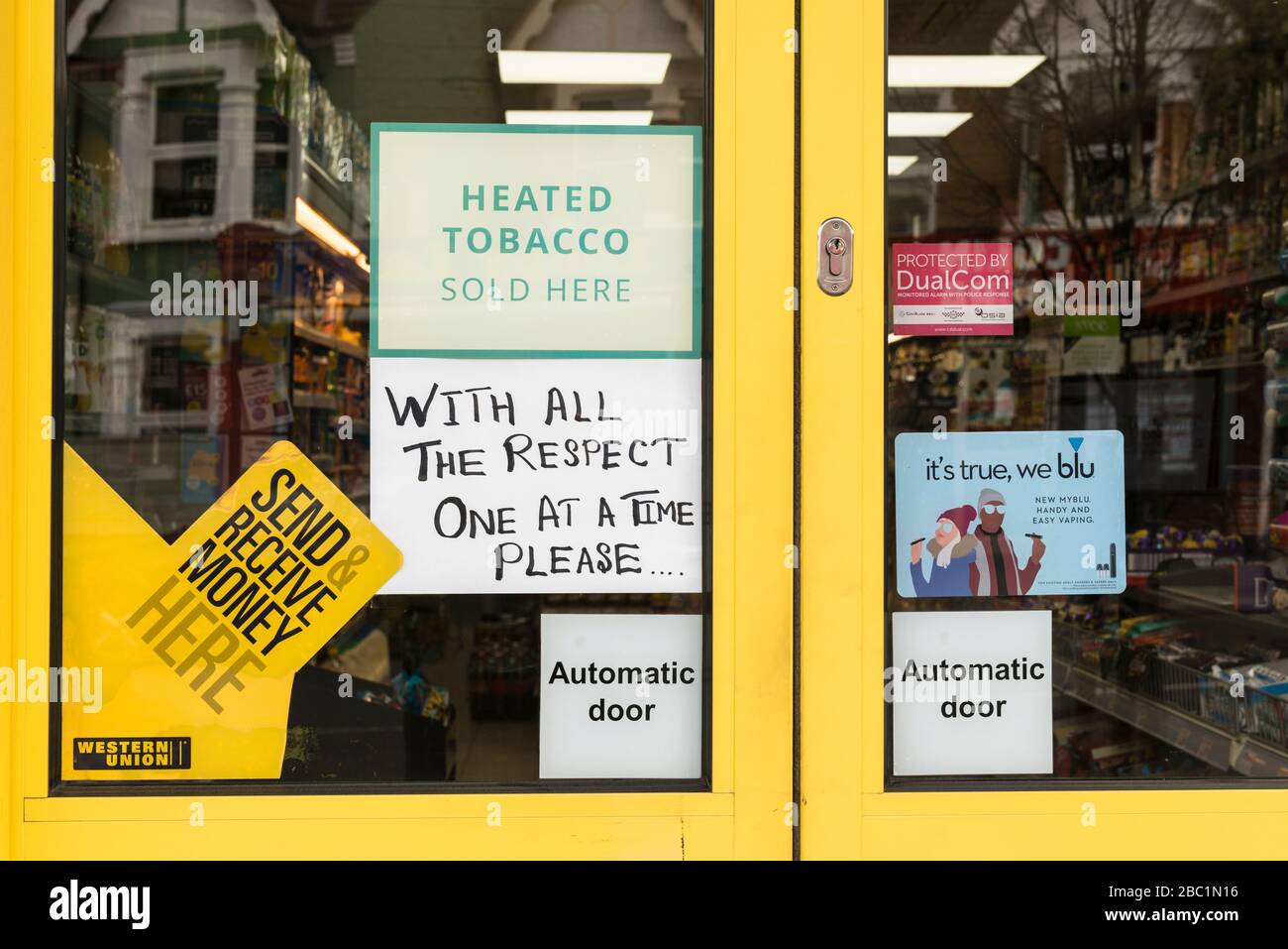 Polite sign saying with respect one person only outside Euro convenience store during the coronavirus outbreak. Northfield Avenue, Ealing, London Stock Photo