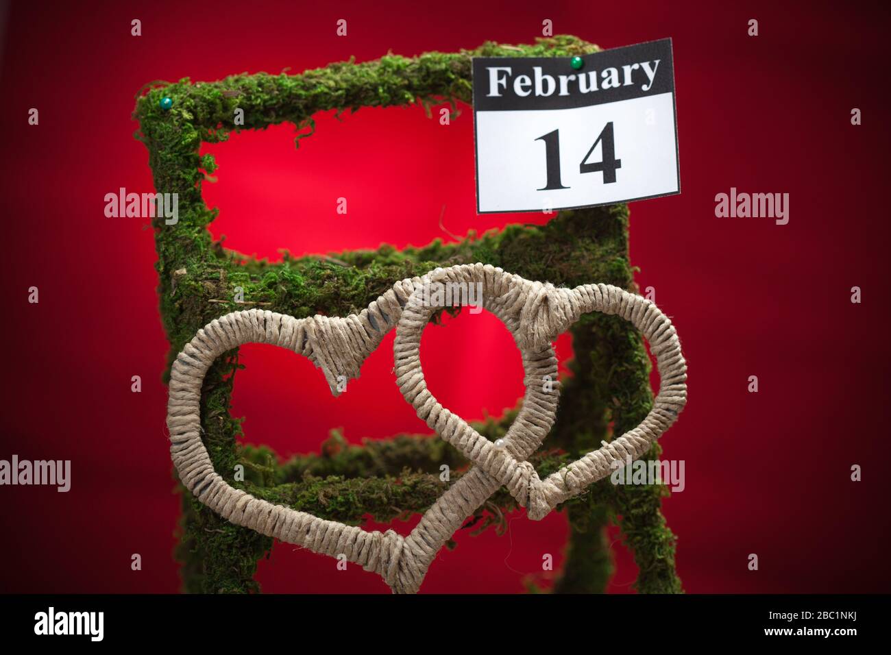 February 14, on the calendar, Valentine's day, red heart, red background Stock Photo