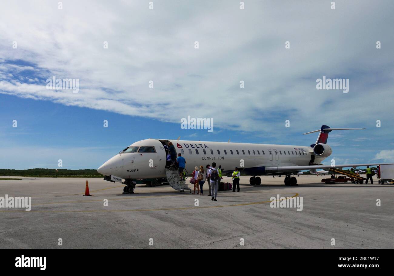 Town, Bahamas January 2018 Passengers boarding a Delta