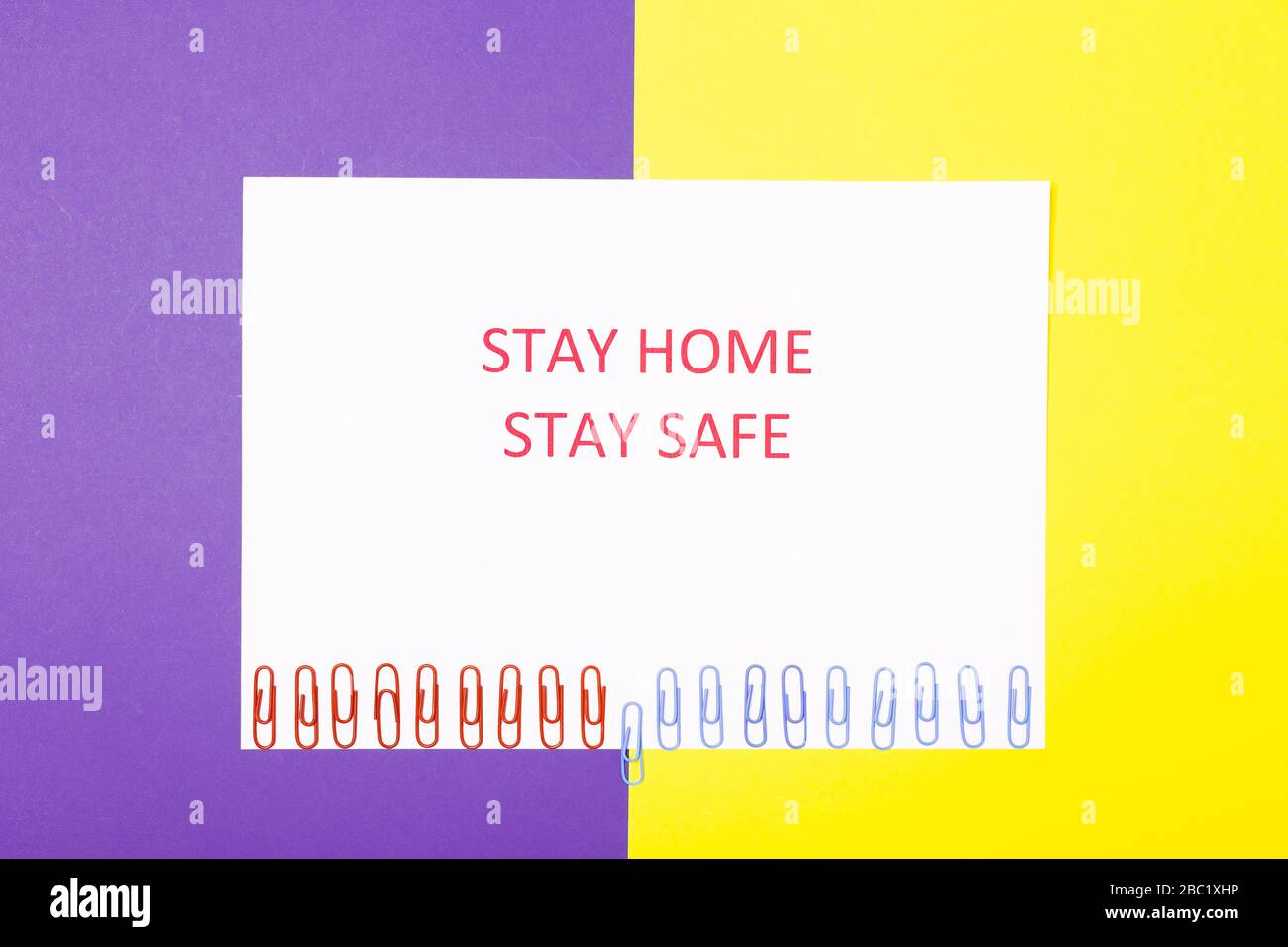Pandemic Protection Concept. Words stay at home. Minimal concept. Stay safe, how to stop coronavirus from spreading. Social Distancing wording. Stock Photo