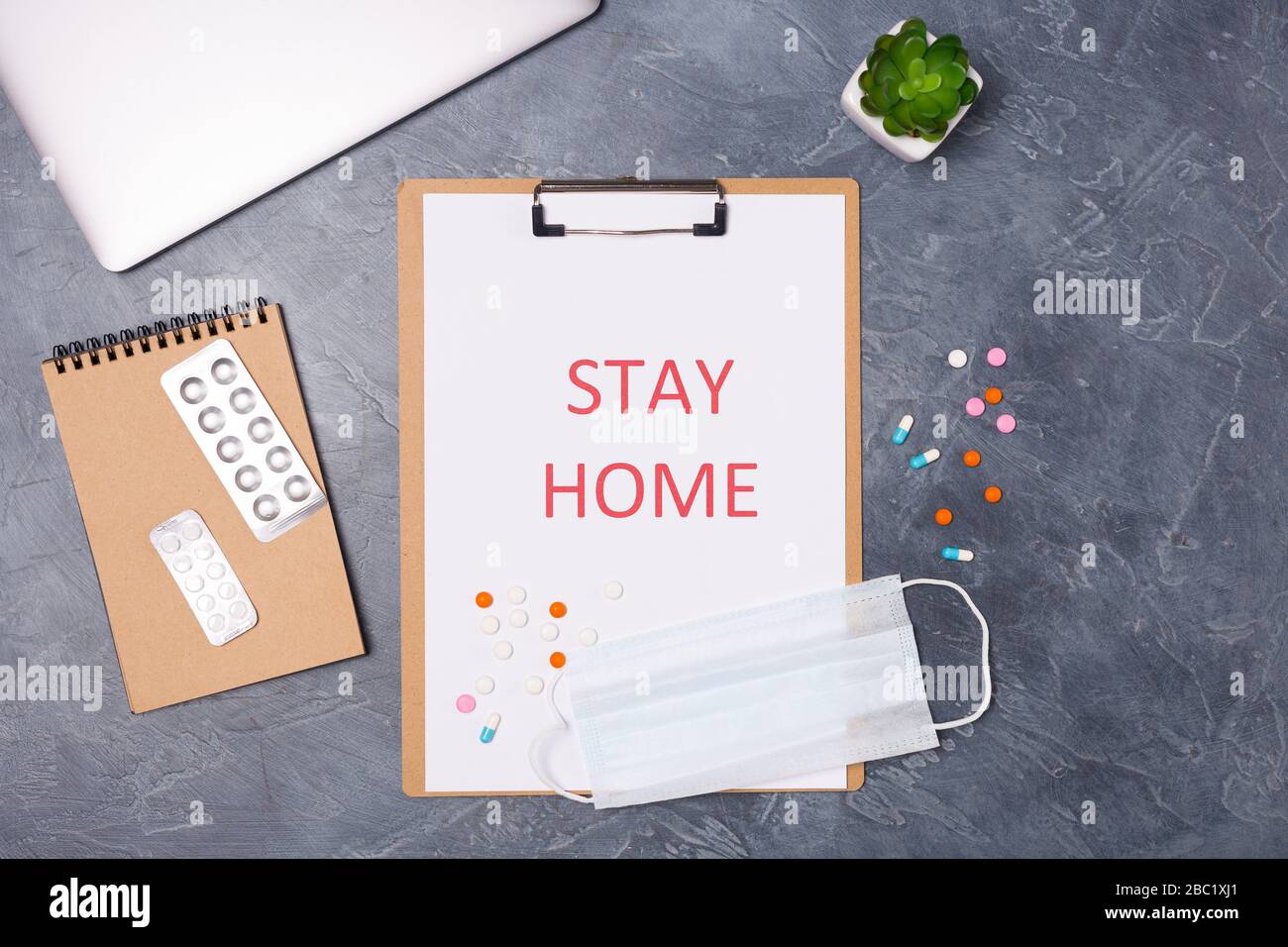 Words stay at home. Pandemic Protection Concept. Words stay at home. Minimal concept. Stay safe, concept of self quarantine as preventative measure Stock Photo