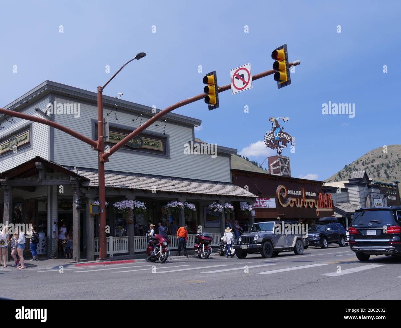 Jackson Hole, Wyoming- August 2018: Street view with cars and people on the streetside in Jackson Hole. Stock Photo