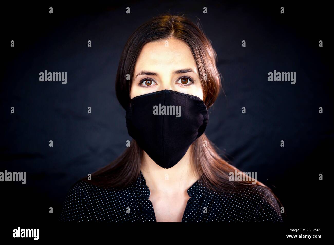Woman wearing leather mask hi-res stock photography and images - Alamy