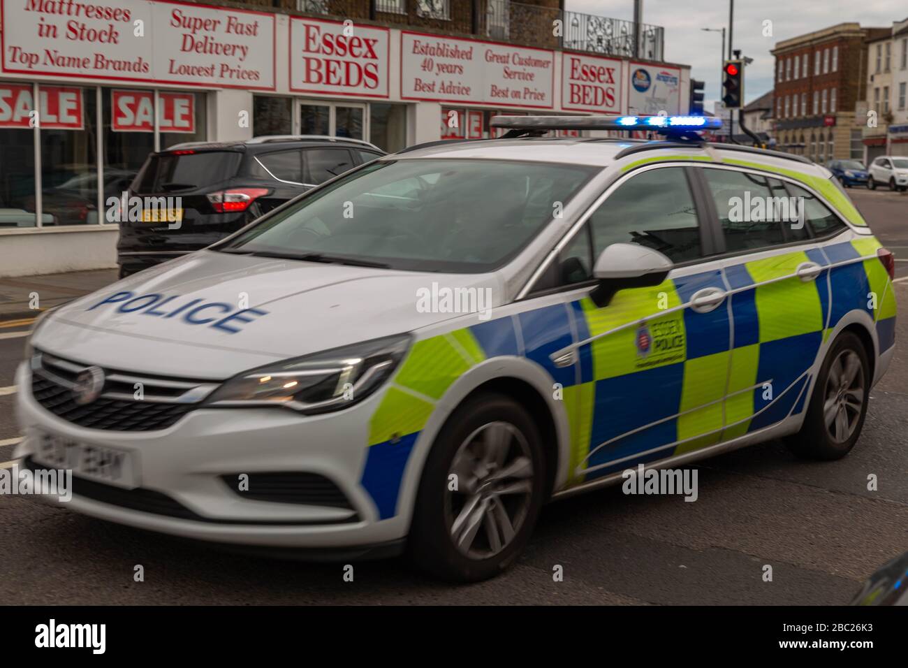 Essex Police car, with blue lights on. April, 2020. Southend-on-Sea, UK