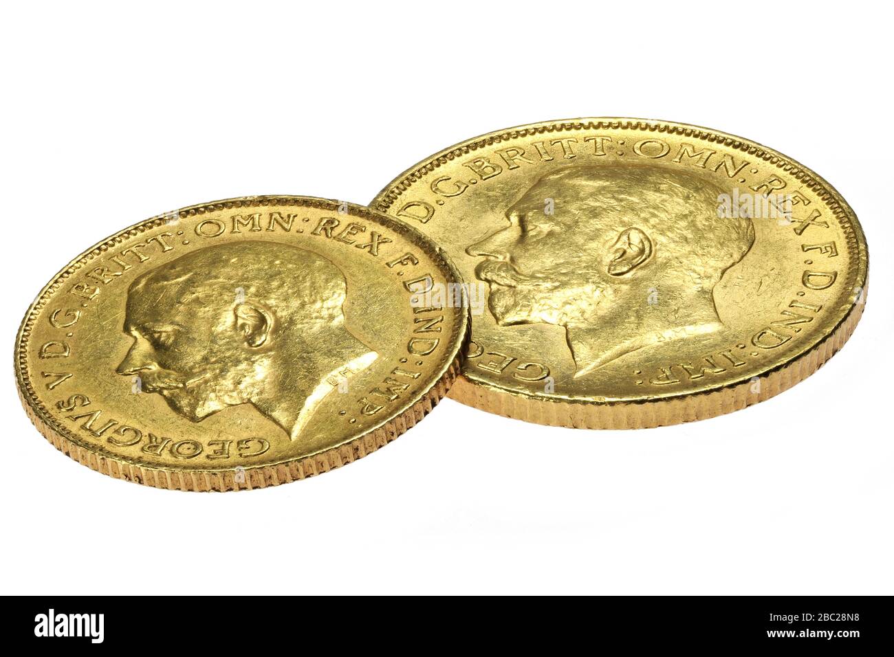 British full and half Sovereign gold coins (George V) isolated on white background Stock Photo