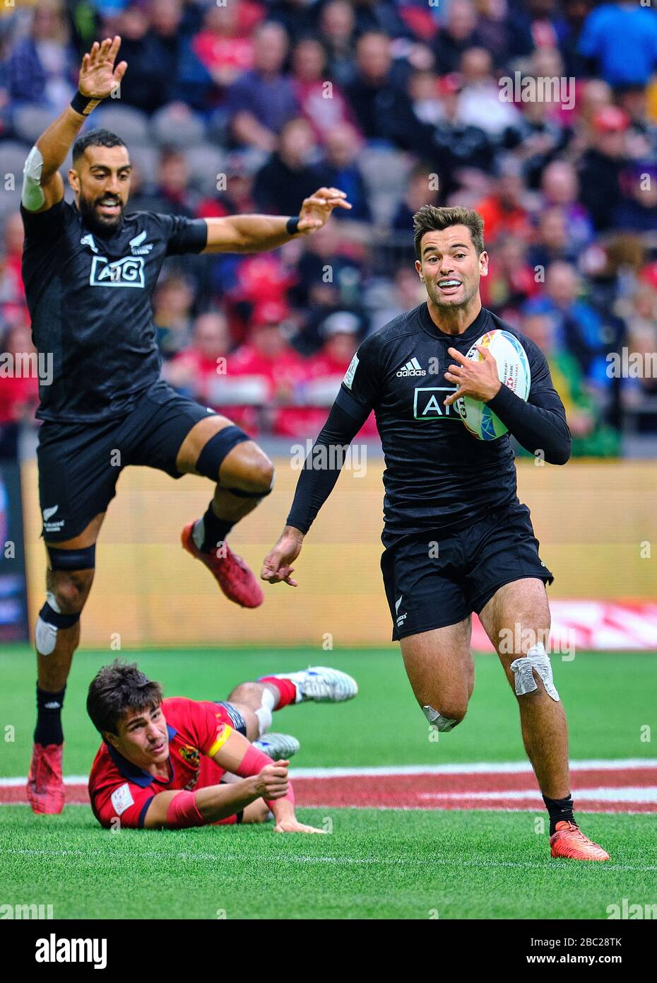 Vancouver, Canada. 7th March, 2020. Andrew Knewstubb #8 of New Zealand gets by Spain tackler in Match #14 during Day 1 - 2020 HSBC World Rugby Sevens Stock Photo
