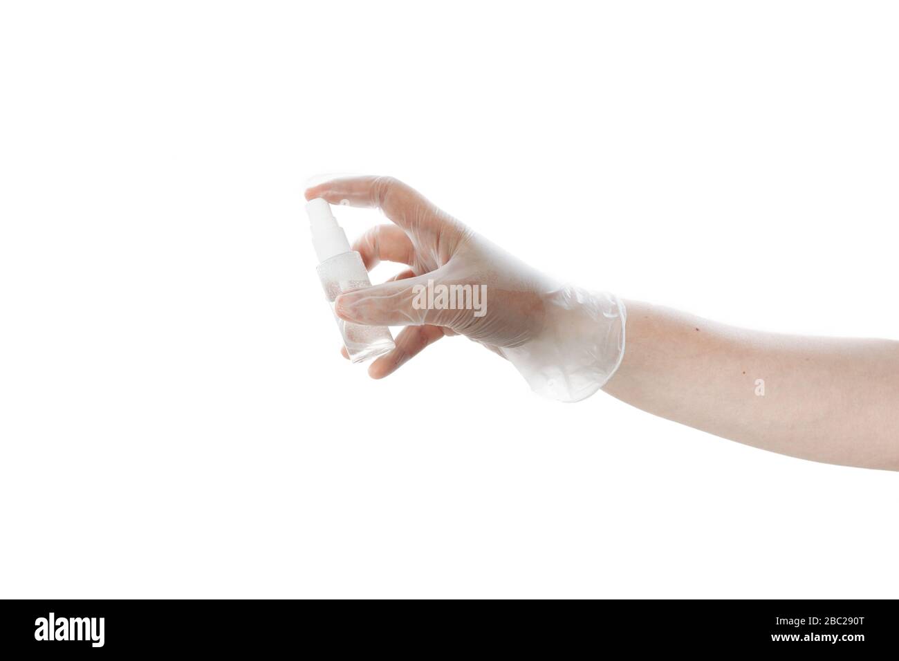 Disinfect your hands after walking. A hand in a transparent latex glove holds an antiseptic in