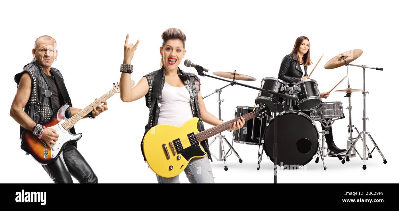 Two female and one male musician in rock band performing isolated on