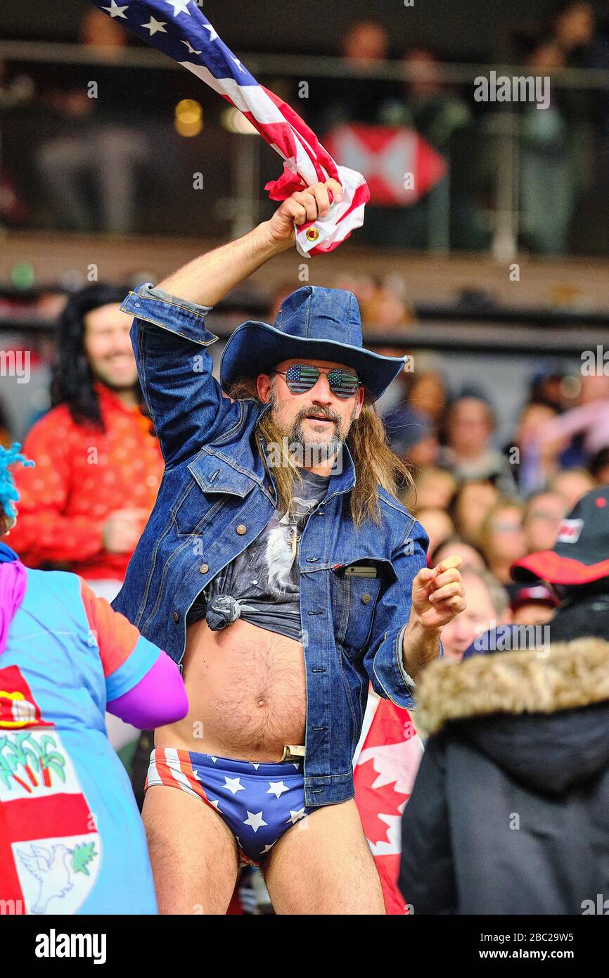 Vancouver, Canada. 8th March, 2020. An American fan cheers on the USA team as they take to the field against Fiji in Match #37 (5th Place Semi Final) Stock Photo