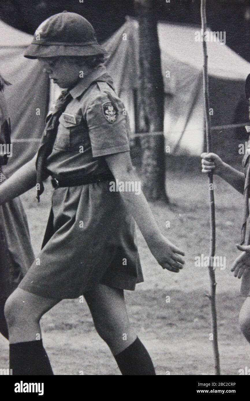 1970s vintage Girl Scouts marching in line at a campsite Stock Photo Alamy