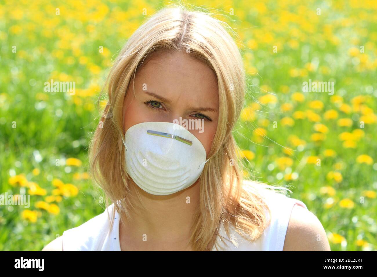 Woman wearing protective mask in corona crisis Stock Photo