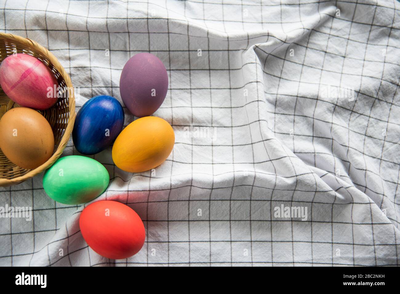 colorful easter eggs in a basket Stock Photo