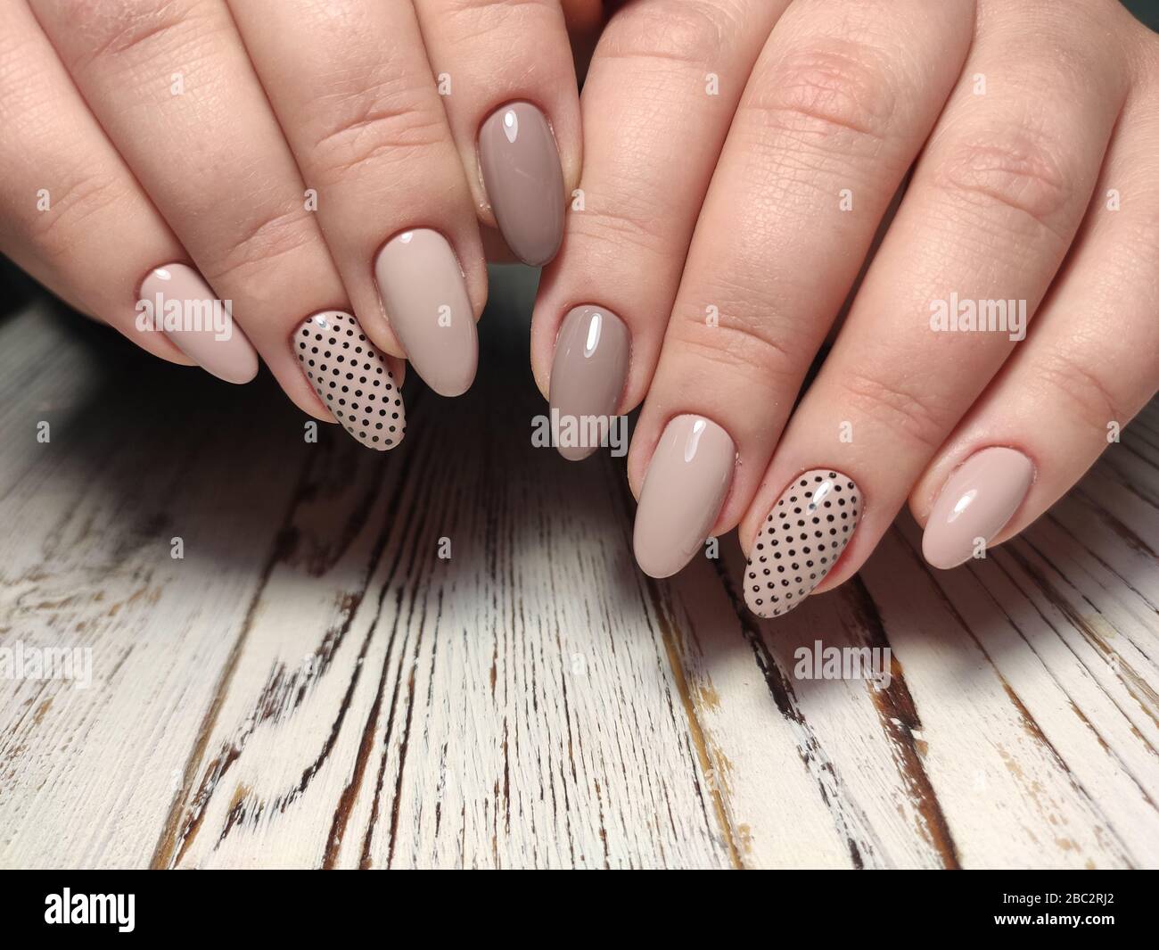 Closeup photo of a beautiful female hands with elegant manicure and ...