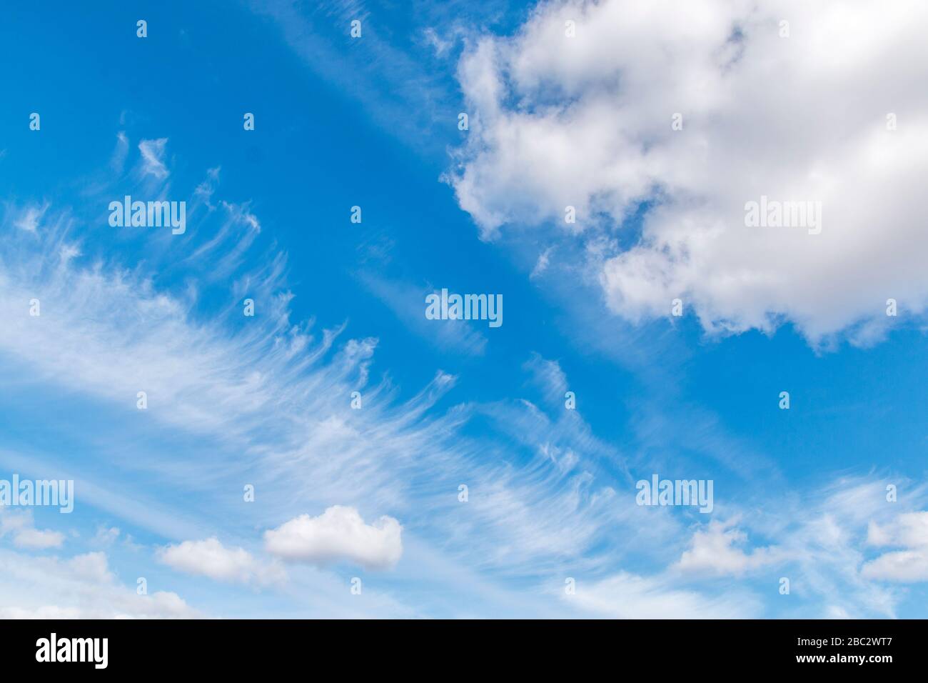 Blue sky with white clouds.on a clear day. soft clouds Stock Photo - Alamy