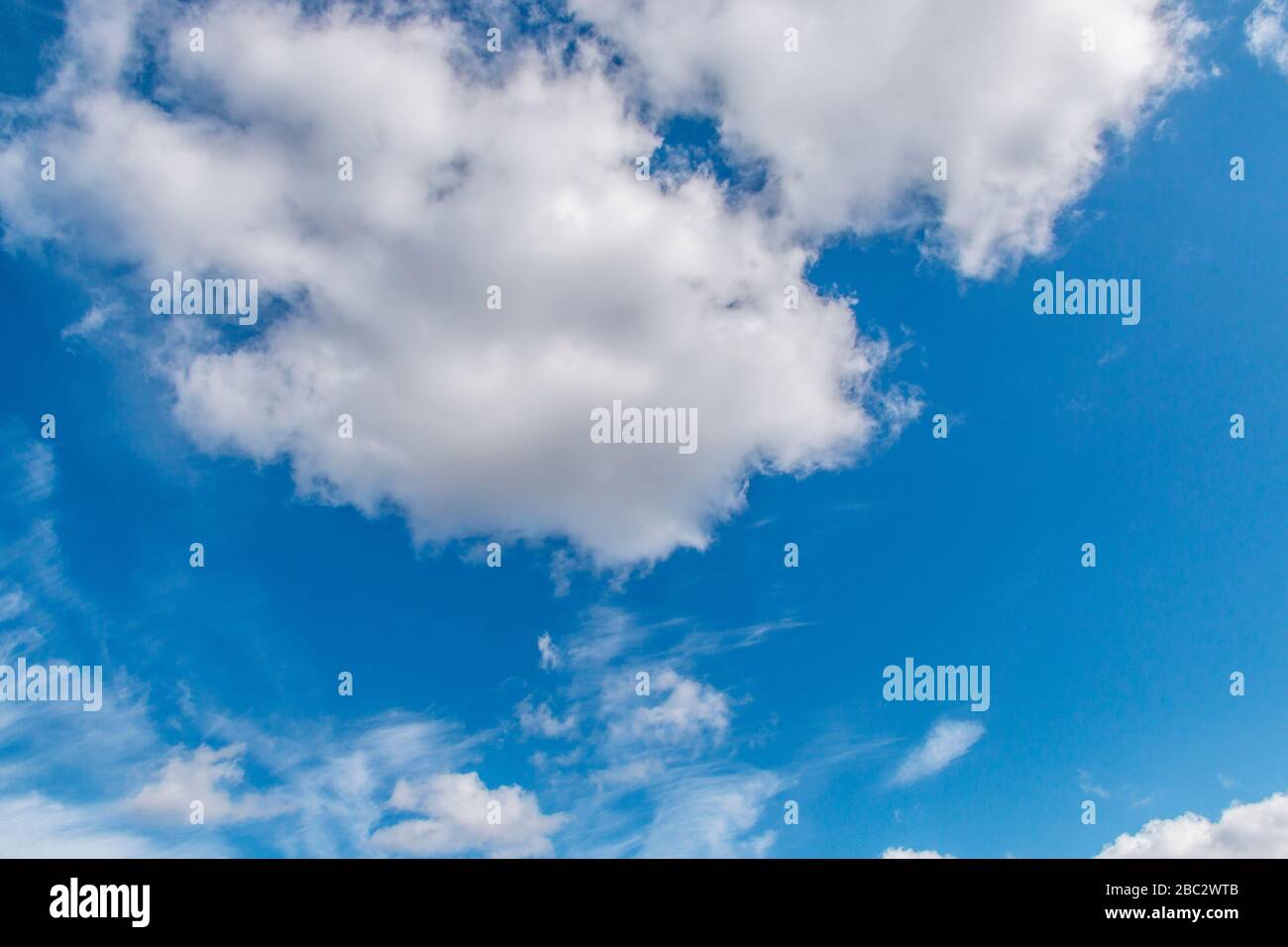 Blue sky with white clouds.on a clear day. soft clouds Stock Photo - Alamy