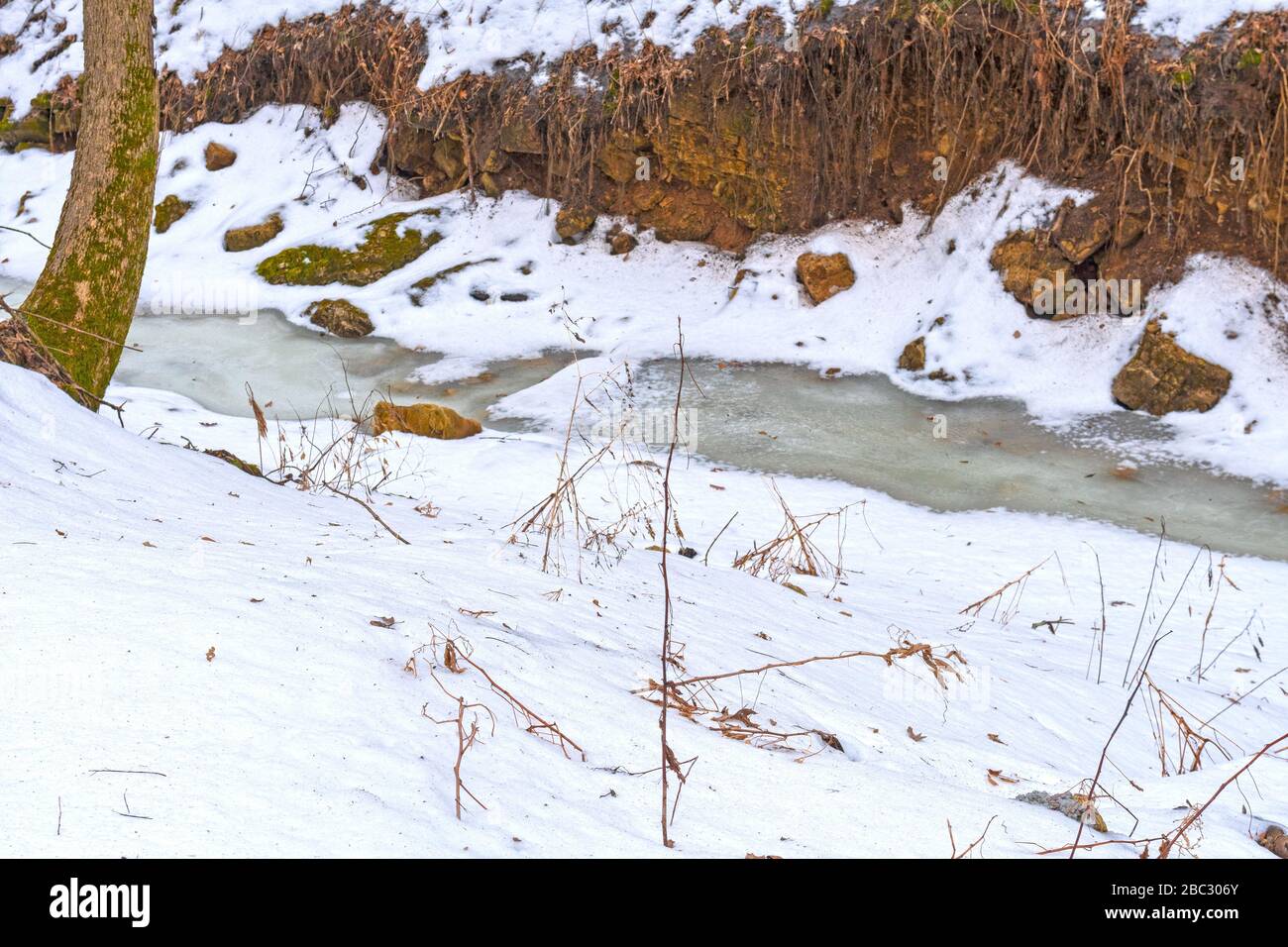 Frozen Creek in the Heart of Winter in Wyalusing State Park in Wisconsin Stock Photo