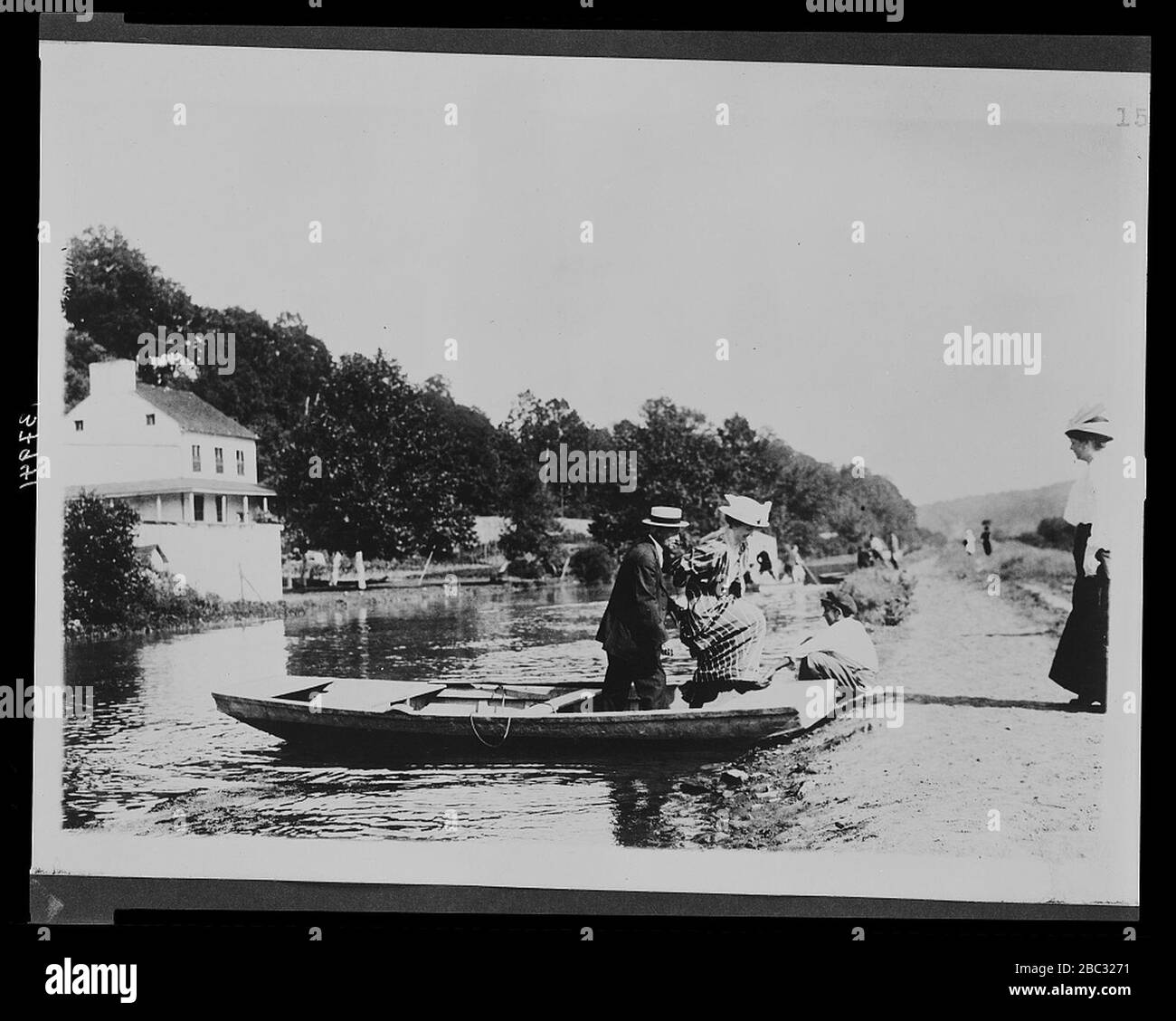 Group disembarking from a rowboat along the Chesapeake and Ohio Canal