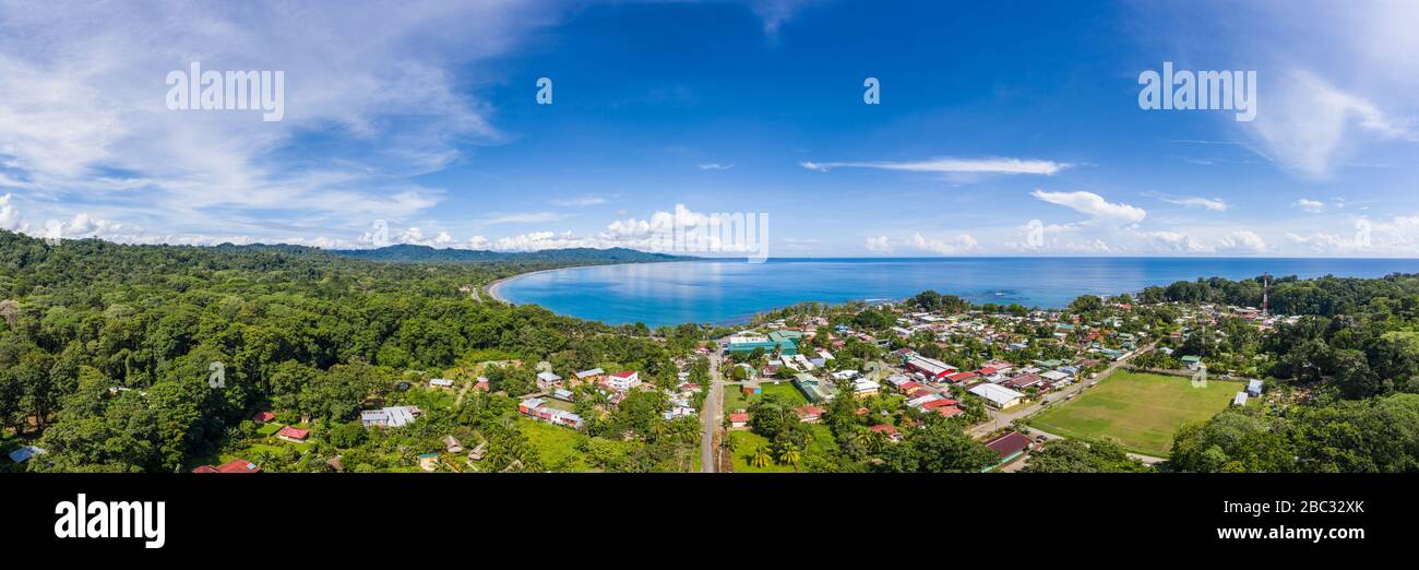 Aerial panoramic view facing Playa Negra and the southern coastal Caribbean town of Puerto Viejo de Talamanca in Limón Province, Costa Rica. Stock Photo