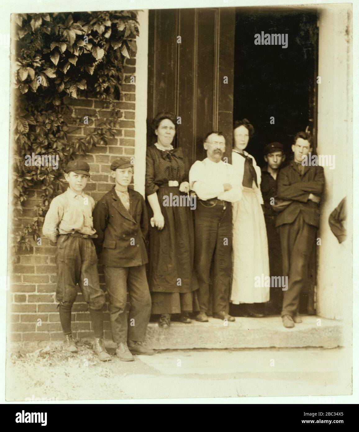 Group working in Holden-Leonard Co., Bennington, Vt. Smallest boy is Louis Godbout, 132 Lincoln St.,. Stock Photo
