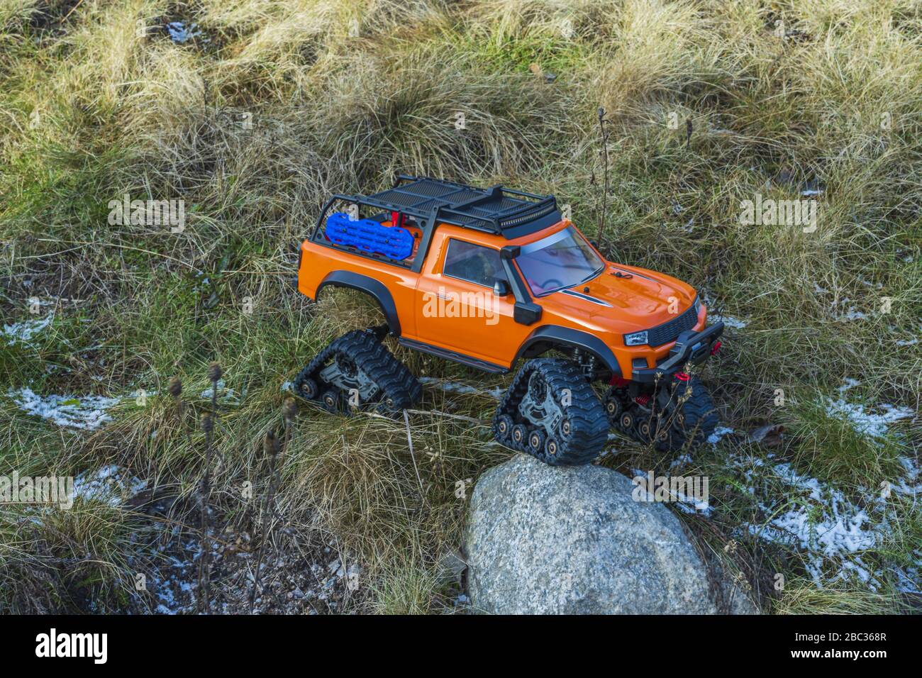 View of radio controlled model racing car on off-road background. Toys with  remote control. Free time. Children and adults concept Stock Photo - Alamy