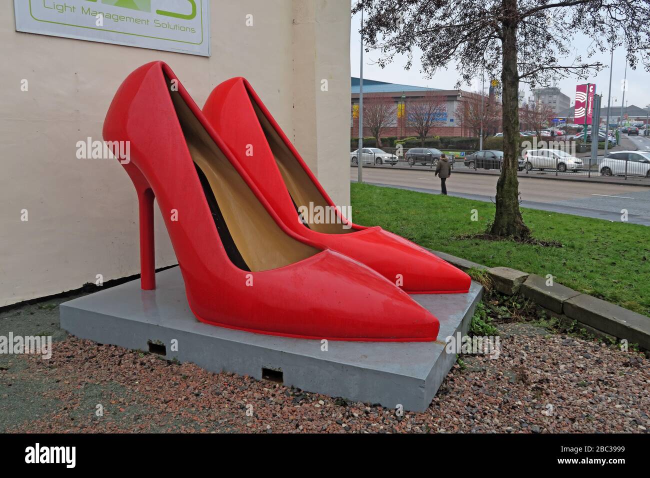 Giant Pair of Red Shoes in Warrington Town Centre, Cheshire, England, UK, WA1 2PF Stock Photo