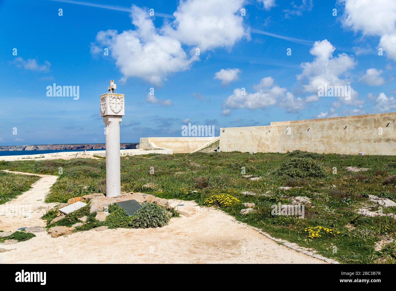 Marker stone with coast of arms of Henry the Navigator in Fortaleza de Sagres, Fort of Henry the Navigator, Sagres, Algarve, Portugal Stock Photo