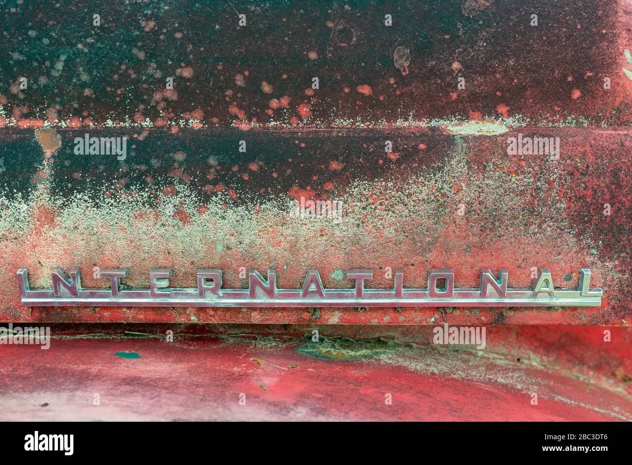 Cassiar, British Columbia, Canada - July 24, 2017: The International logo on a corroded truck panel in a junkyard Stock Photo