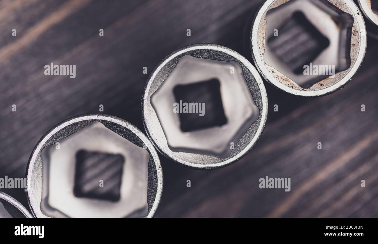 DIY tools - Socket wrenches on wooden worktop Stock Photo