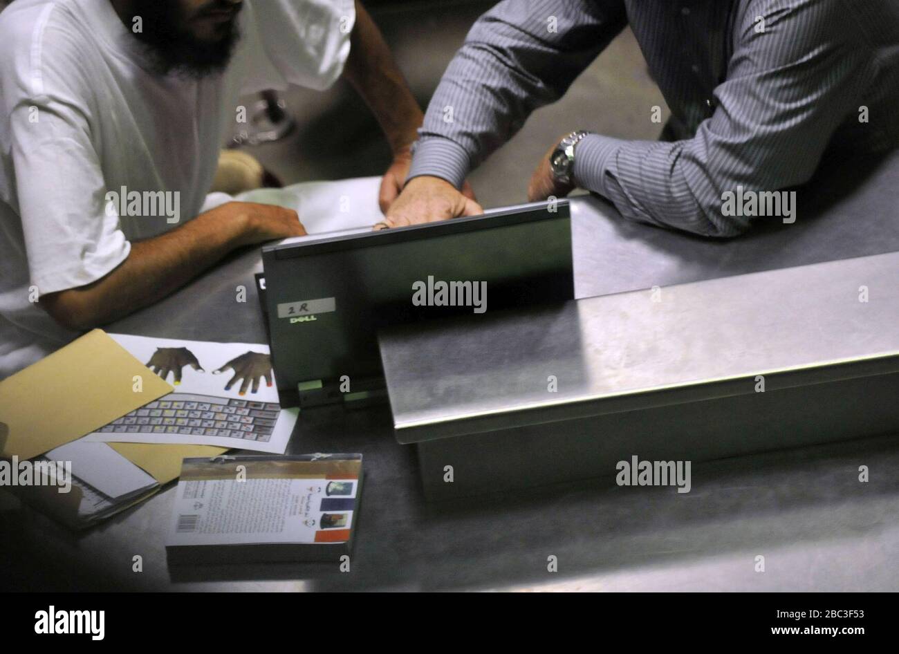 Guantanamo captive gets computer literacy training -b. Stock Photo