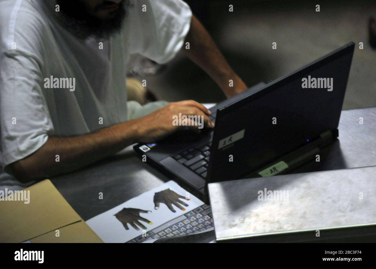 Guantanamo captive gets computer literacy training -c. Stock Photo