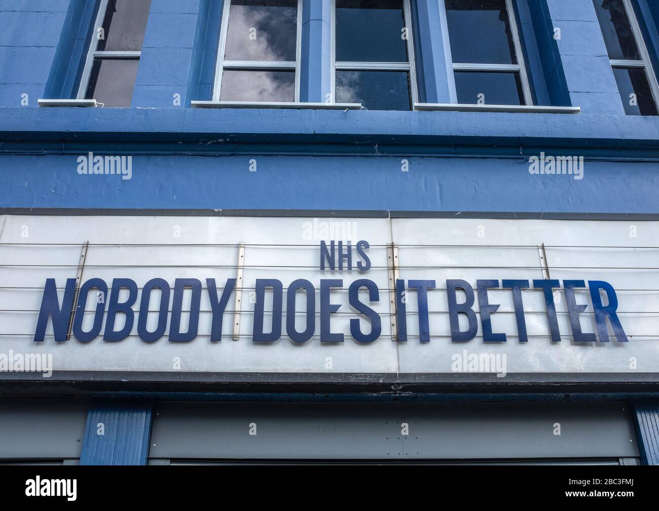 GLASGOW, UK – MAR 28 2020 - A Tribute To The British National Health Service (NHS) On A Theatre Marquee During The Coronavirus Pandemic Stock Photo