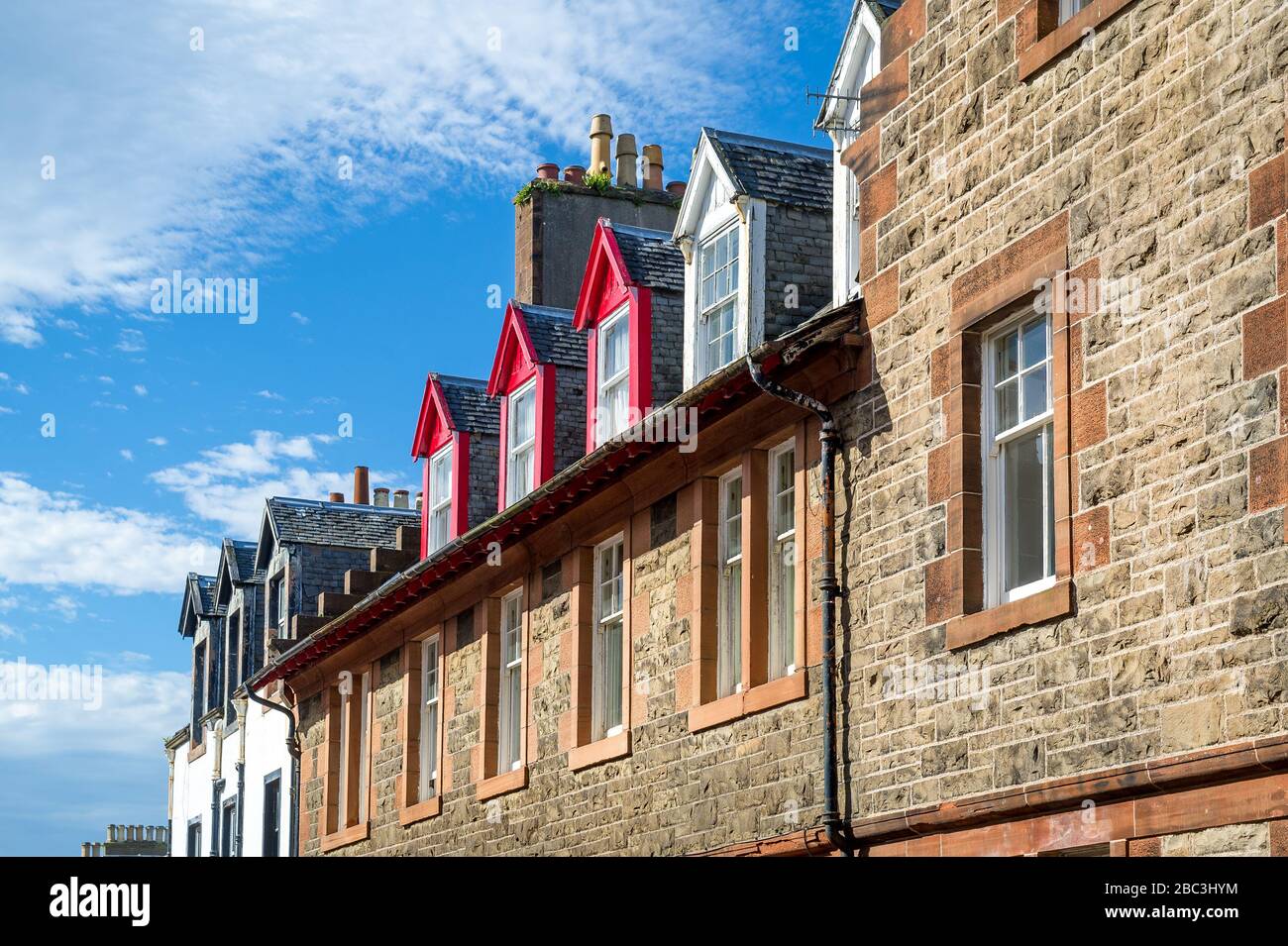 Upper floor of old buildings with colorful decoration. Campbeltown old town, Scotland. Stock Photo